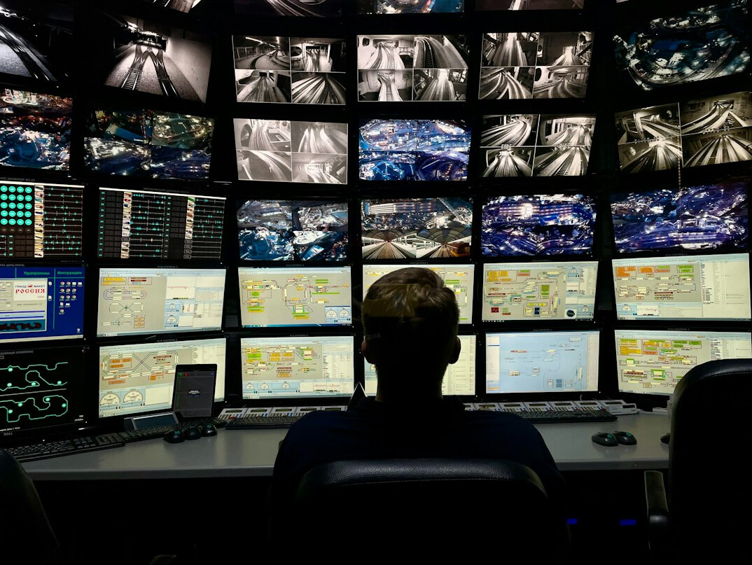 security guard monitoring cameras